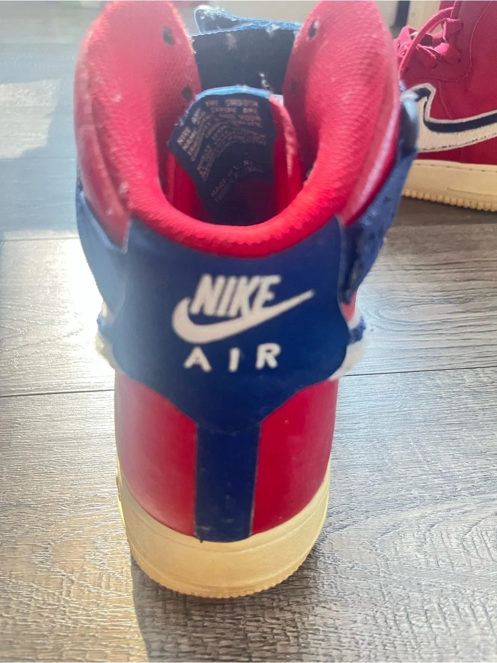 Nike Red High-Top Sneakers with White and Navy Swoosh